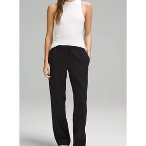 Lululemon‎ Straight Leg MR LuxTreme Pant Regular Black Womens Size L Athleisure
